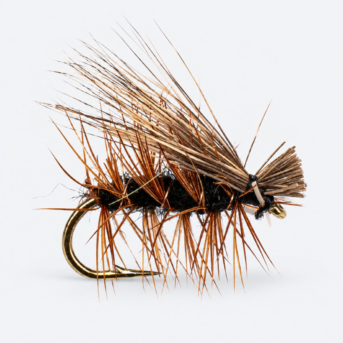 Black Elk Hair Caddis single fly on a pale gray background