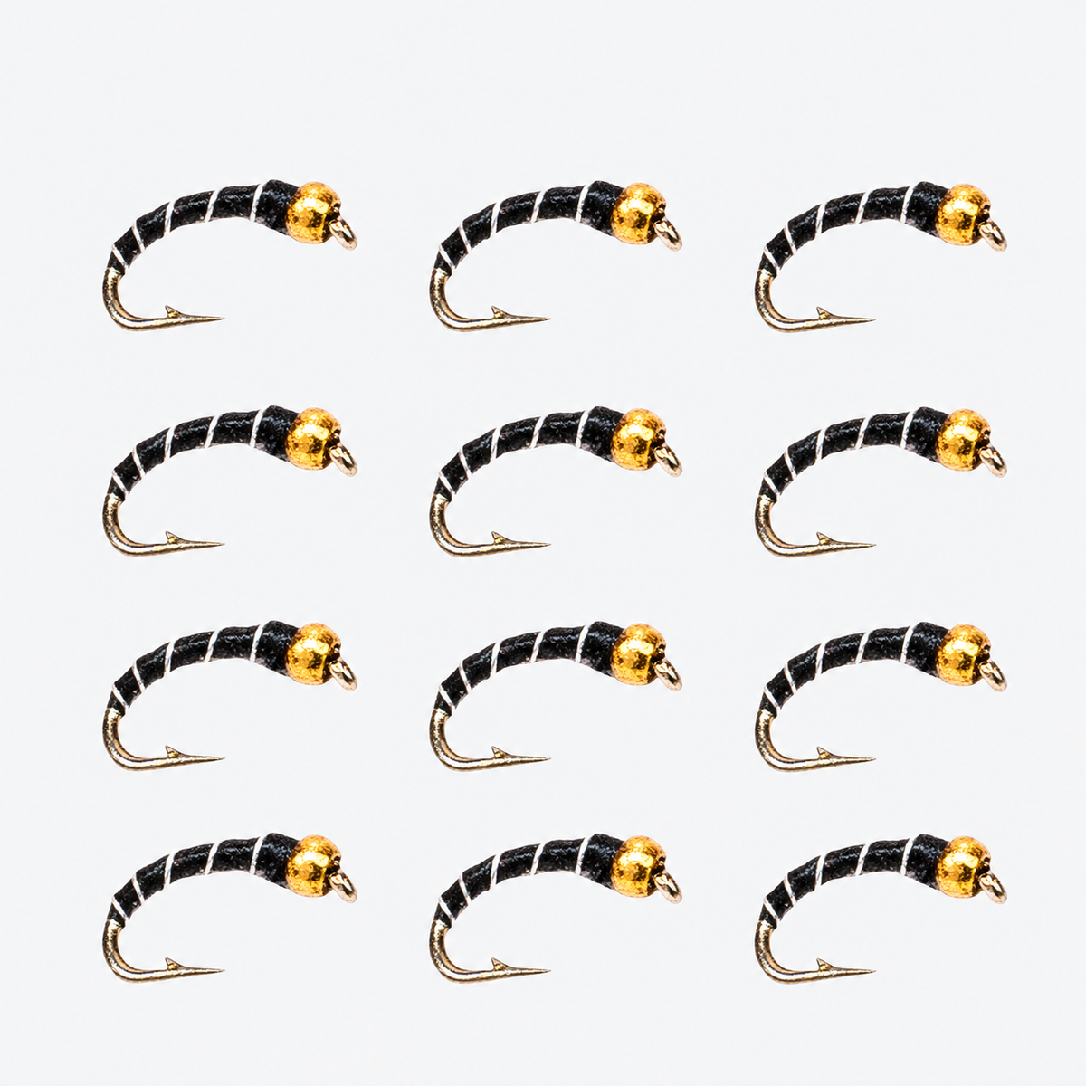 12 Pack Zebra Midge — 12 flies, zebra gold black pack layout