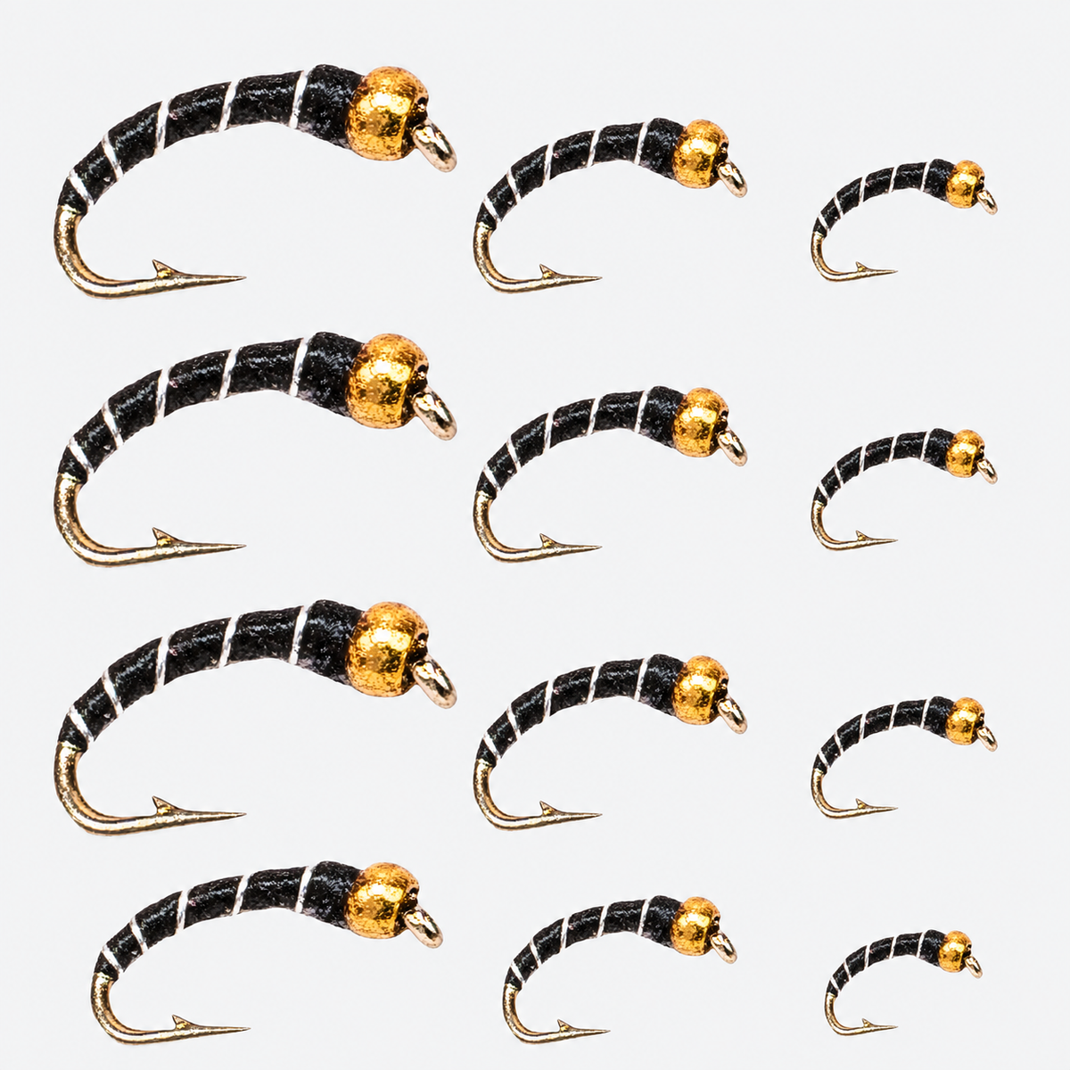 12-Pack Zebra Midge — gold-black flies graded large to small across each row