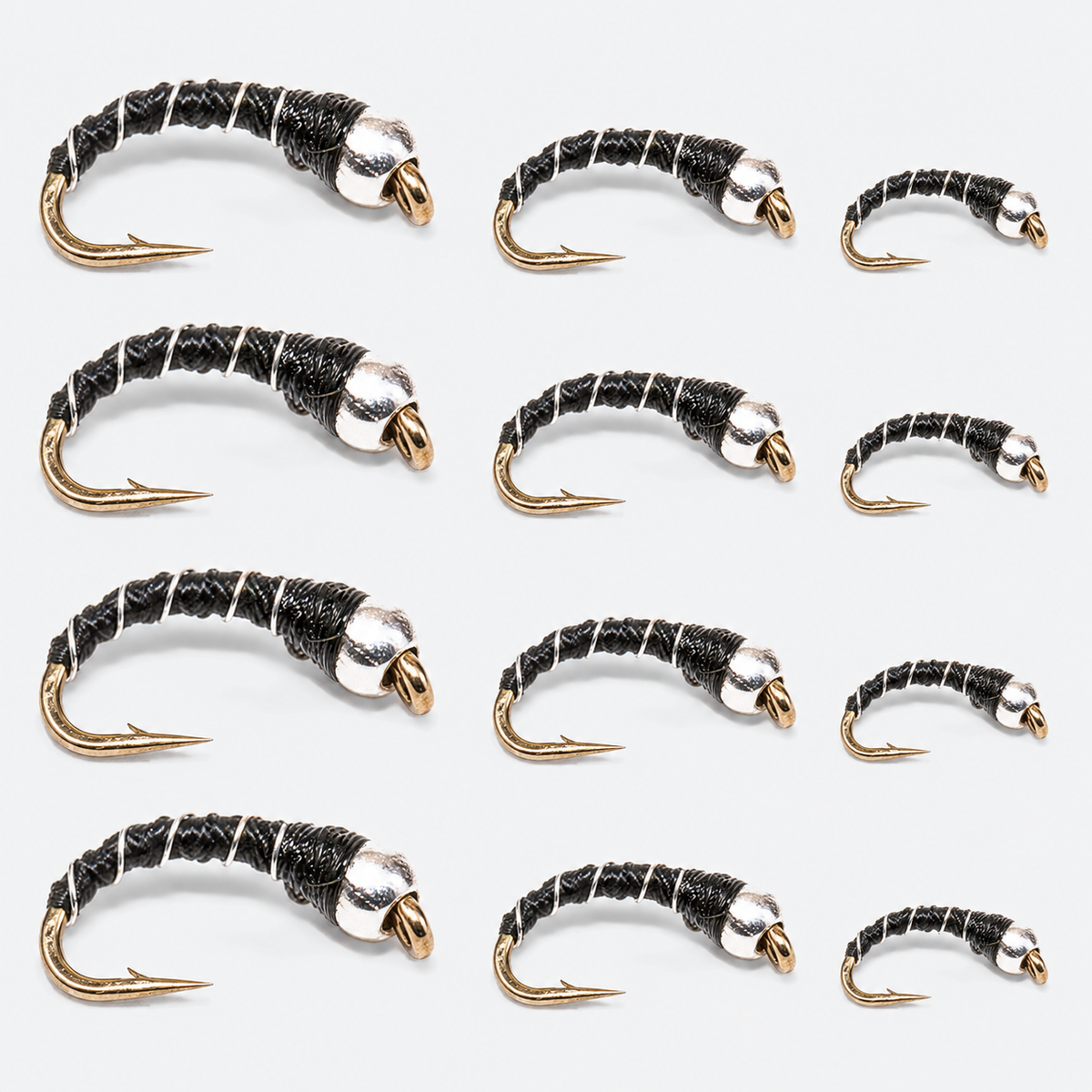 12-Pack Zebra Midge — silver-black flies graded large to small across each row