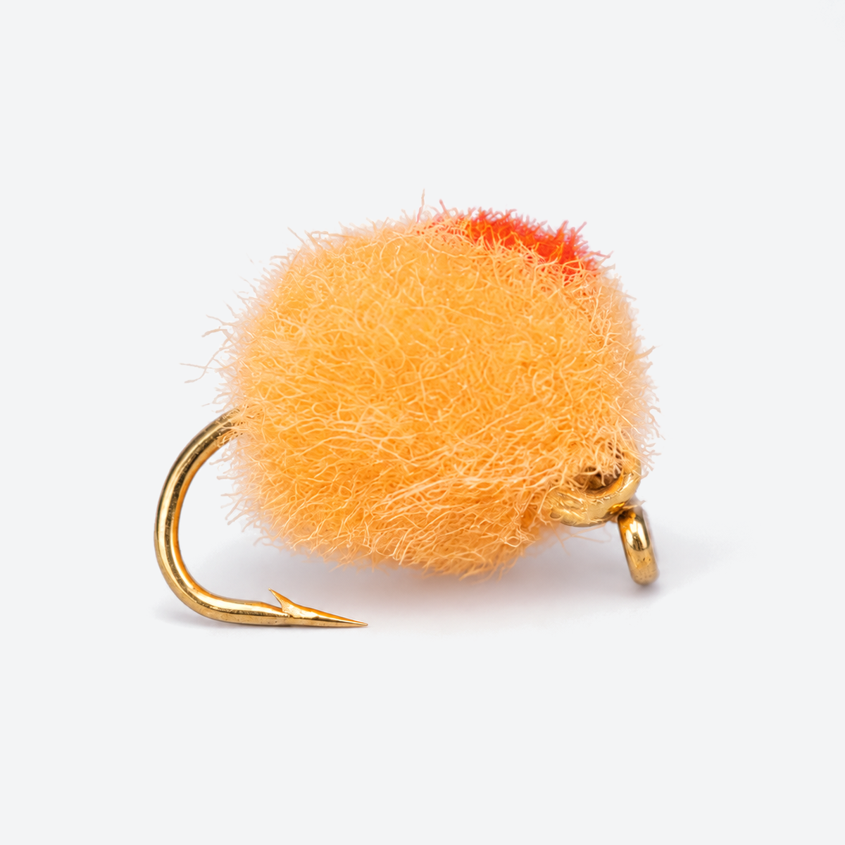 Beaded Glo Bug single fly on a pale studio background