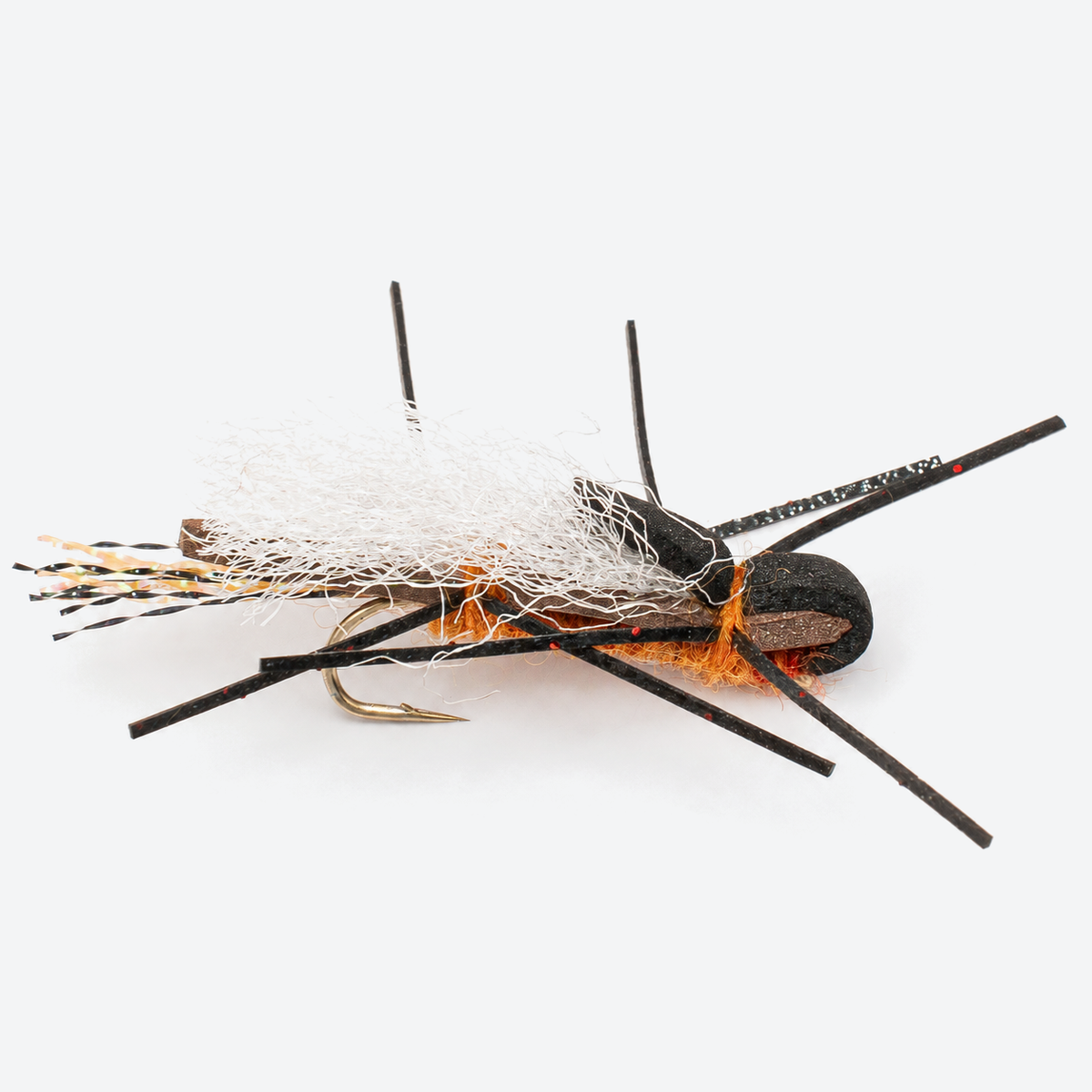Henrys fork salmonfly fly on a pale studio background